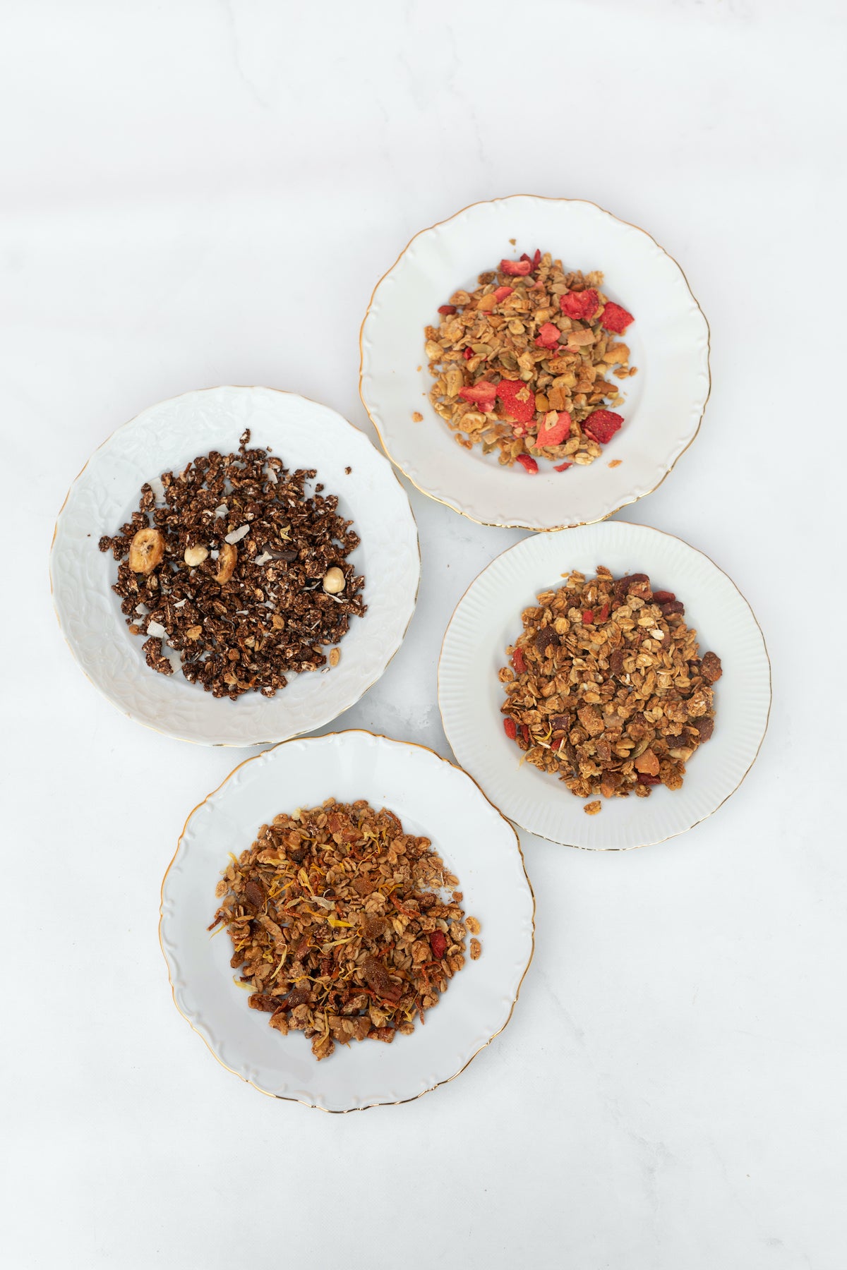 Heerlijke granola in de smaken choco, aardbei-kokos, carrotcake of naturel